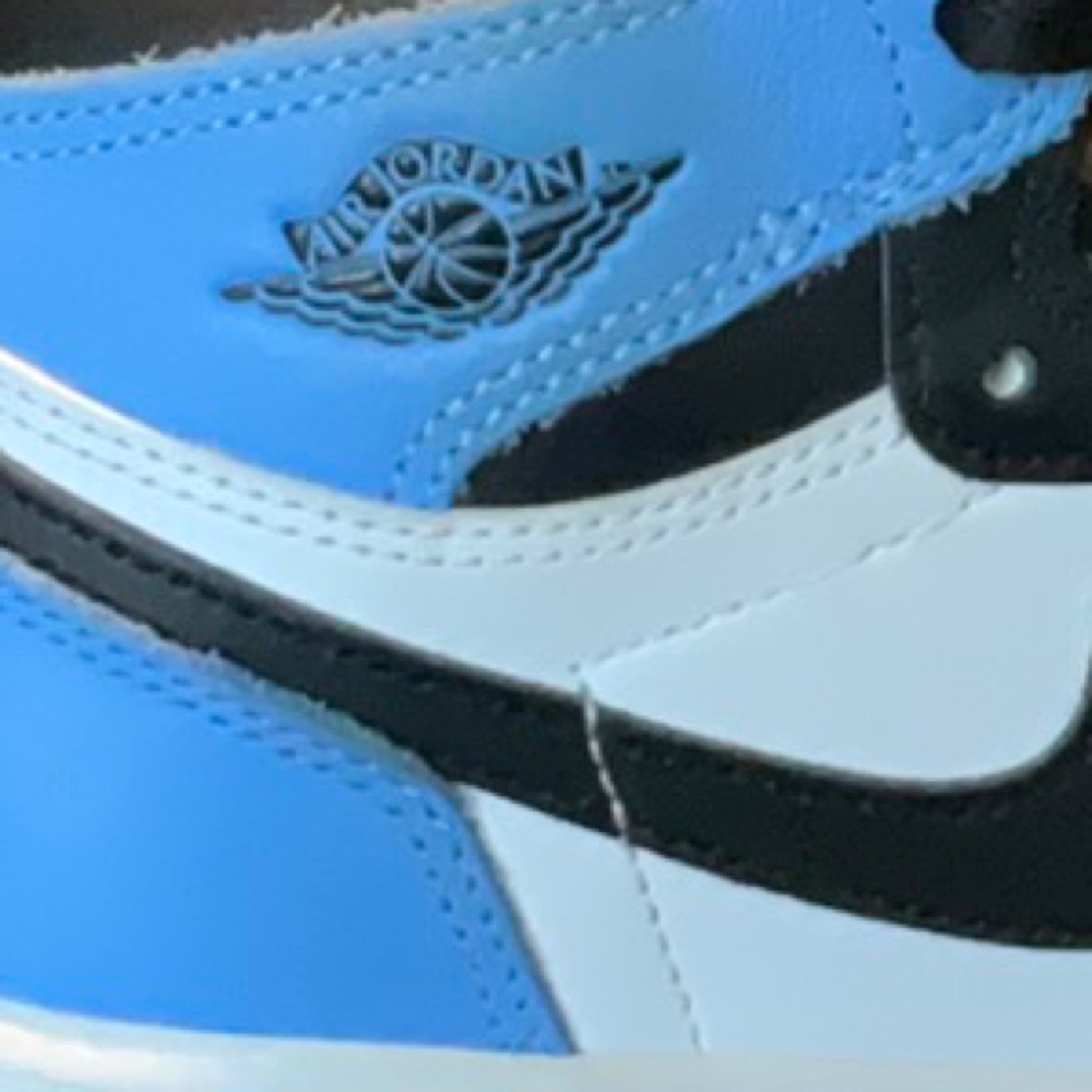 Nike Blue and Black Sneakers with Bold Swoosh